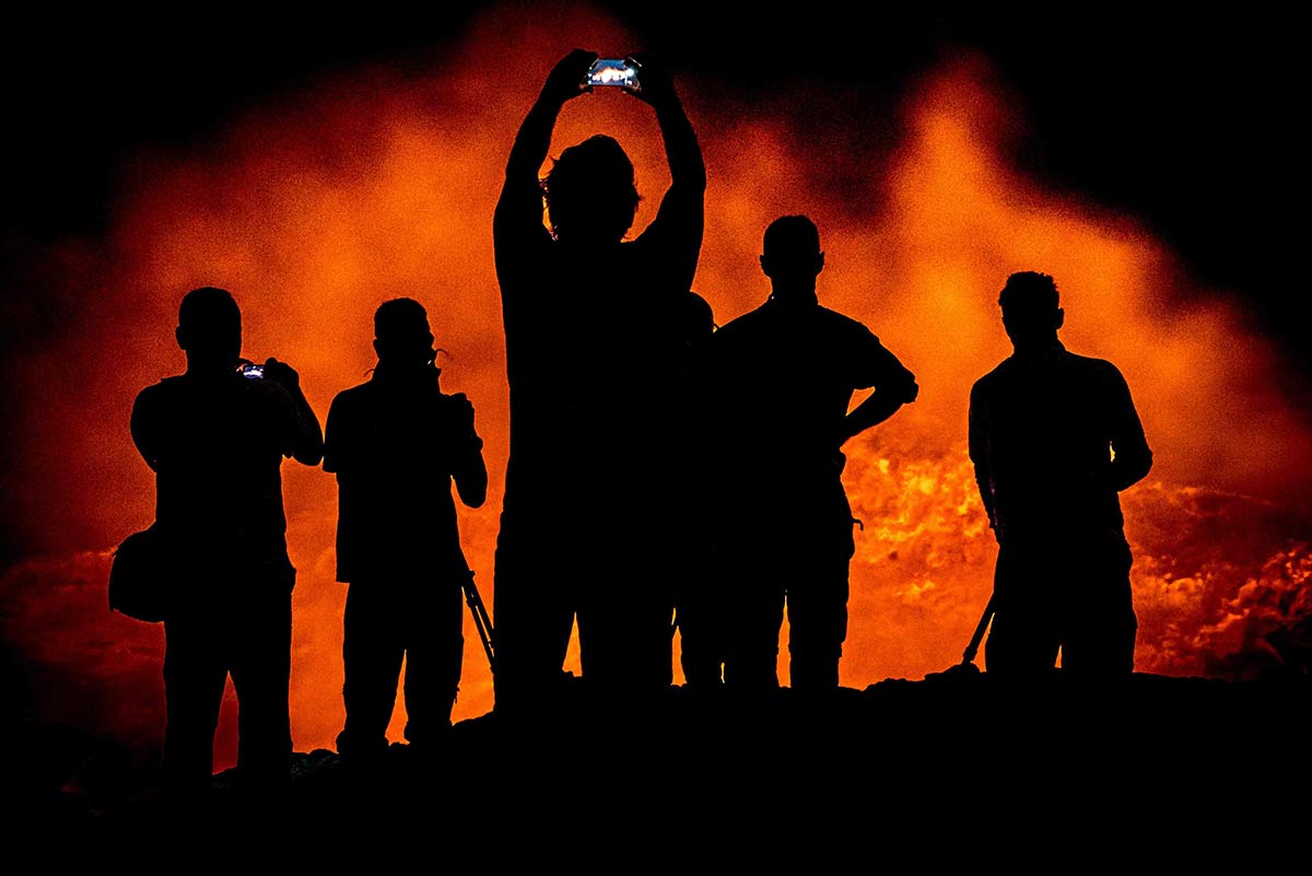 Men In Dark. Capture by Gary Arndt