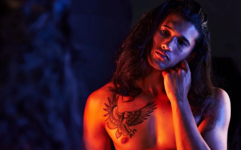 Candid male nude photography moment capturing natural emotion and movement
