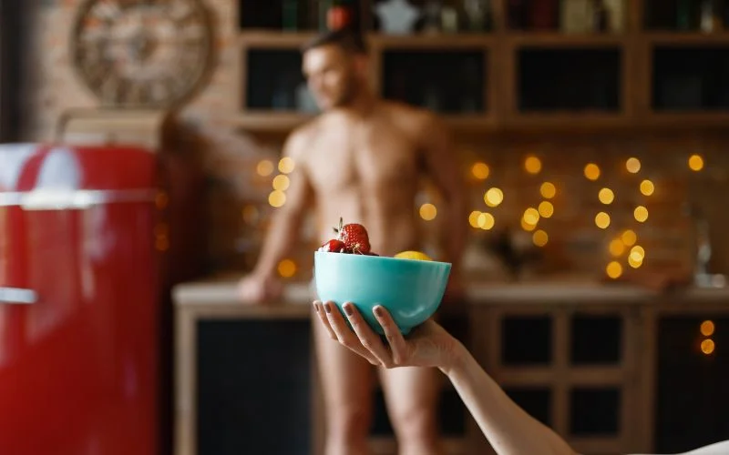 Creative male nude photography incorporating food as an artistic prop