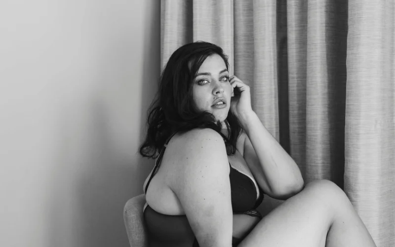 Over-the-shoulder glance pose adding a candid, connecting expression to the shot