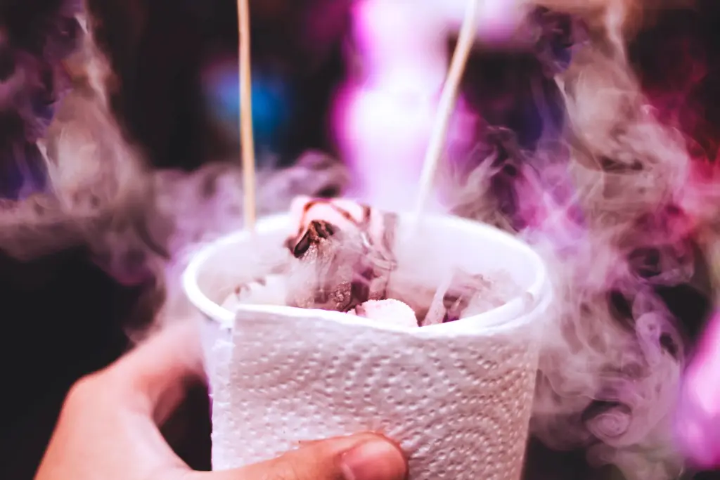 closeup photo of a cup with food