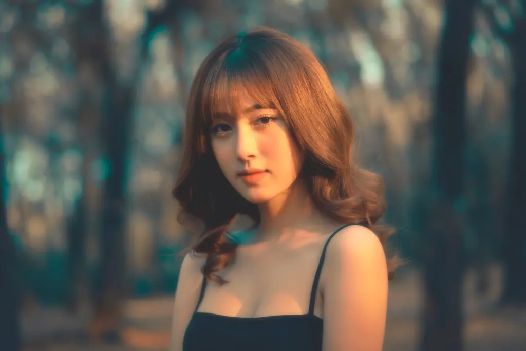 women posing with blurred background