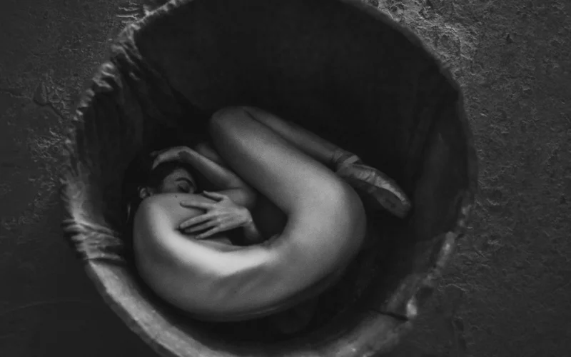 black and white portrait photography with dramatic lighting and strong contrast