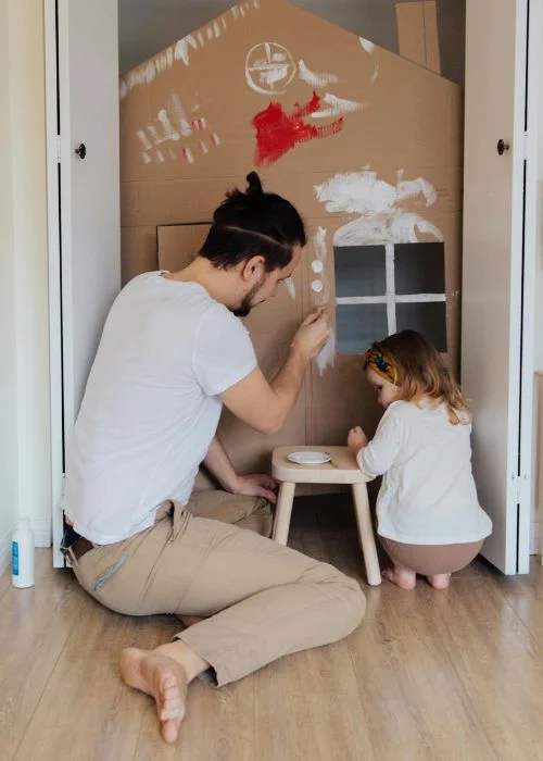 capture father and daughter doing activities