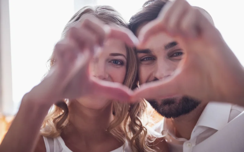 making a heart pose