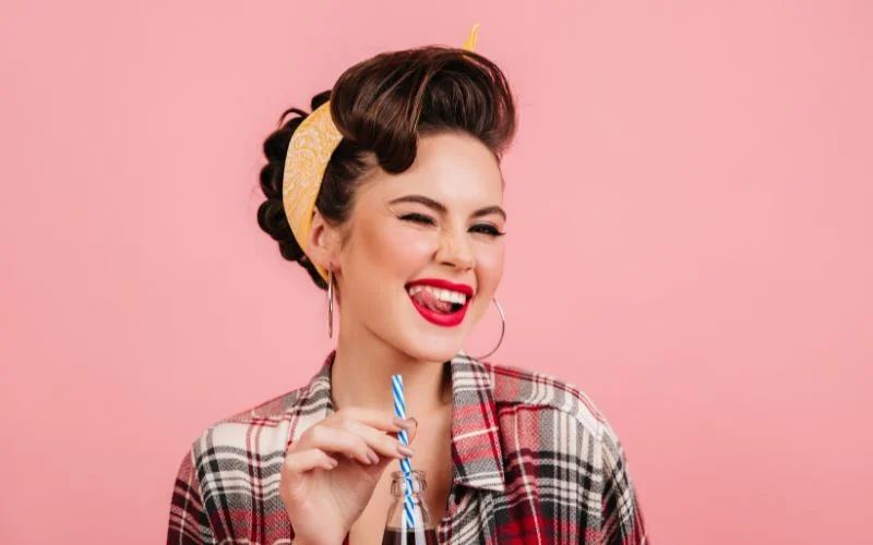 pin up woman giving a cheeky wink to the camera