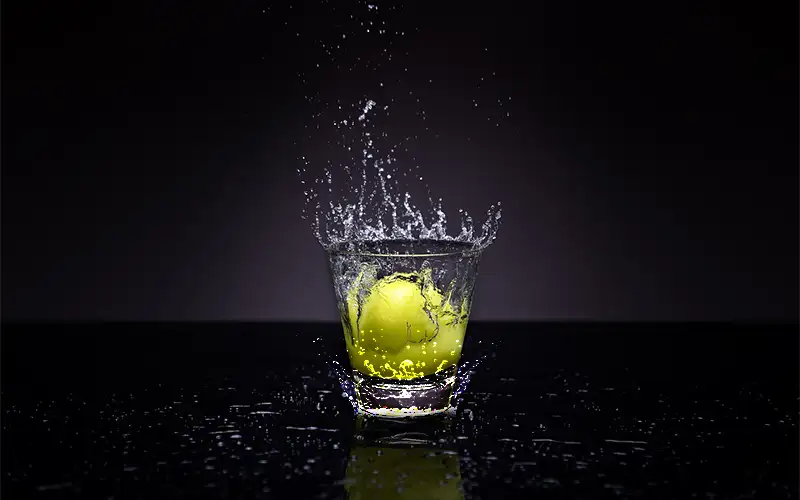 Water splash overlay effect on dark background for Photoshop editing