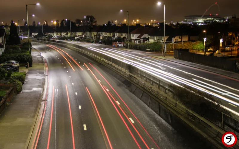 Master long exposure photography to transform busy roads into artistic vehicle light trail compositions.