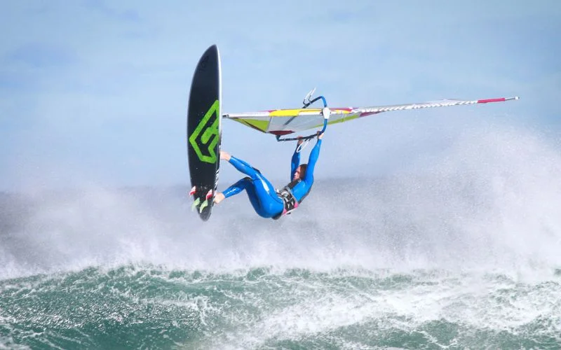 Wind surfer captured mid-jump against the sky at 1/2000 sec shutter speed