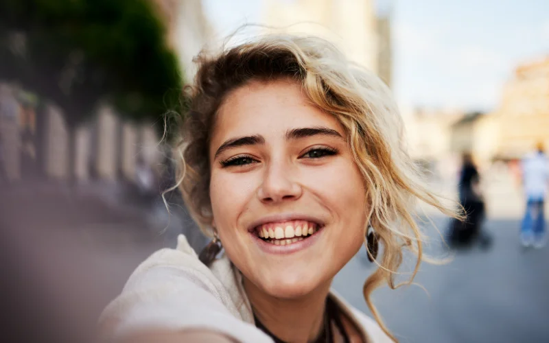 Direct eye contact with camera lens creating authentic and engaging portrait expression