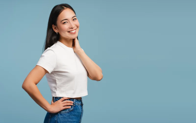Confident posture helping create a more flattering and natural-looking smile for photos