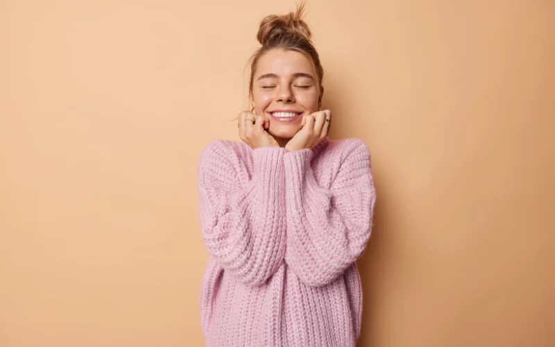 Natural candid smile created by thinking happy thoughts during a portrait session