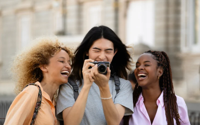 Model creating a softer natural expression using words instead of forced smiling